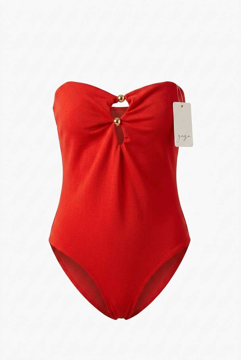 Red swimsuit with a tag on a white background