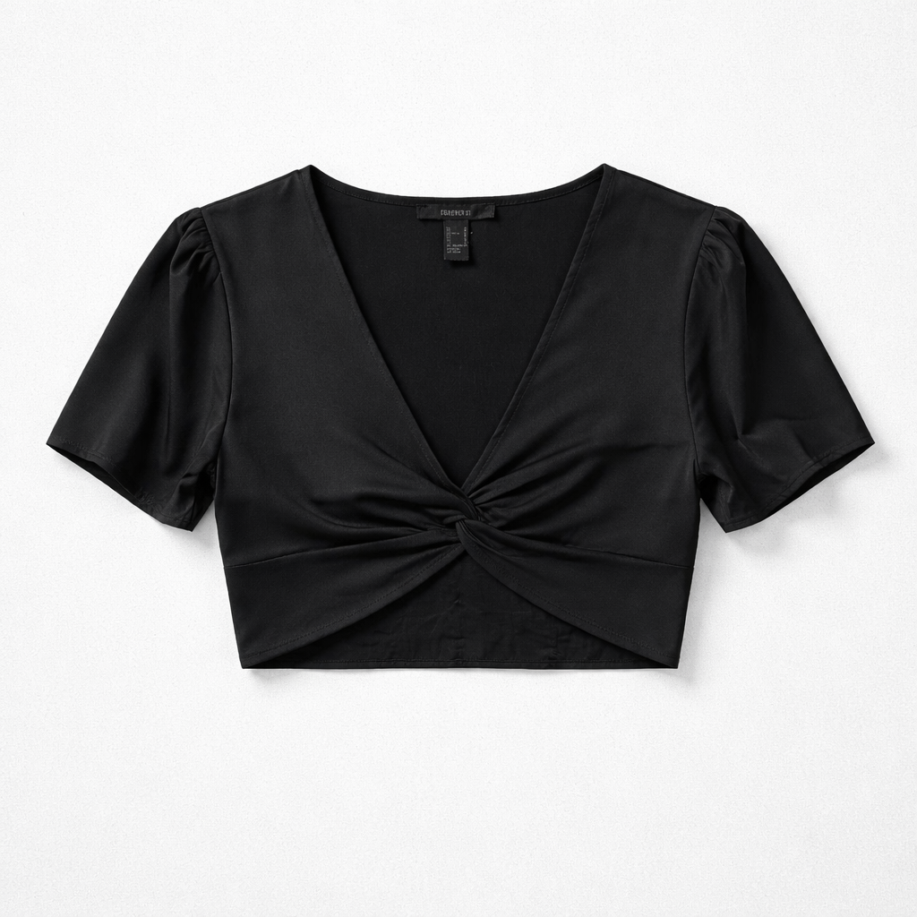 Black crop top with puff sleeves on a white background