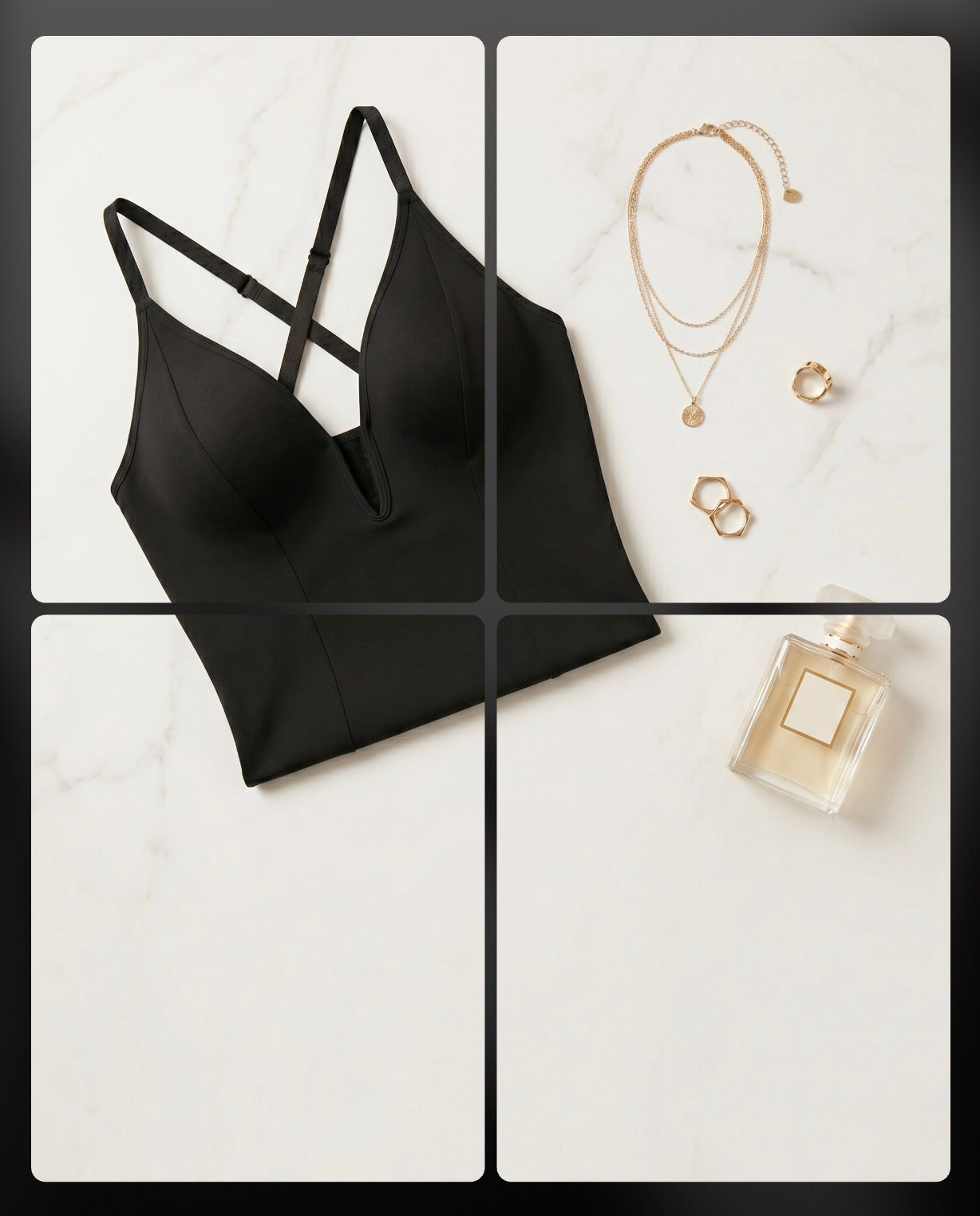 Black bralette with gold jewelry and perfume on a white background