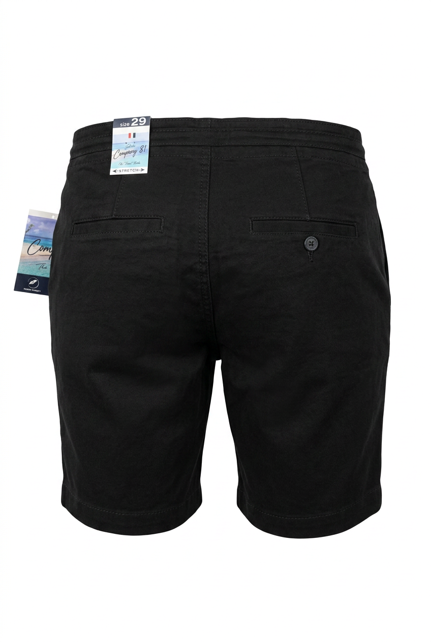 Black shorts with tags on a white background