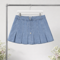 Blue denim skirt hanging on a rack with a white background