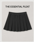 Black pleated skirt on a light gray background with text 'THE ESSENTIAL PLEAT'.