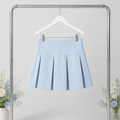 Light blue pleated skirt on a hanger against a light gray background with floral decorations.