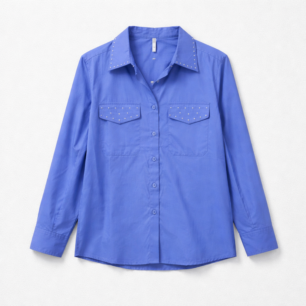Blue shirt with studded details on a light gray background
