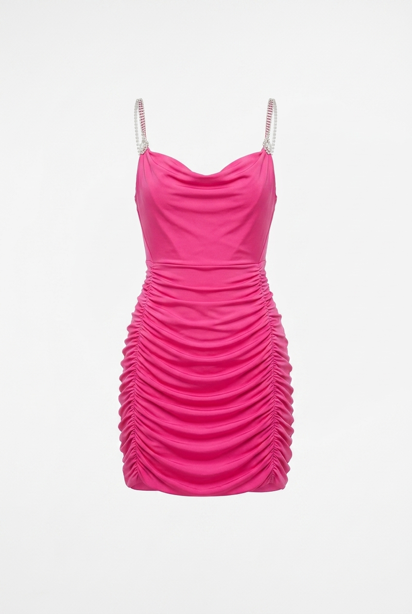 Pink dress with ruched details on a white background