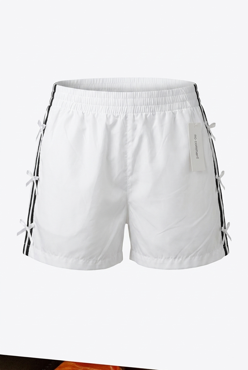 White shorts with black stripes on a white background