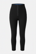 Black leggings with button details on a light gray background